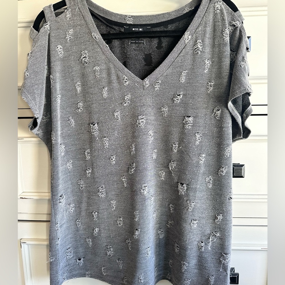 Miss Me distressed top with cut out shoulders.